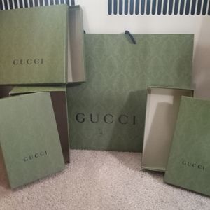 3 Gucci boxes 1 bag